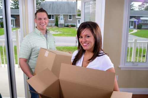 Packed boxes and furniture prepared for small removals in Childshill