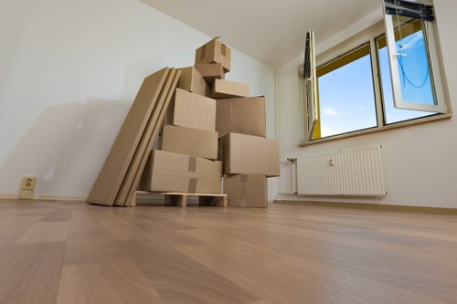 Boxes and household items stored in a secure Childshill storage environment
