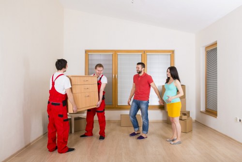 Packed boxes and moving supplies prepared for a Childshill relocation